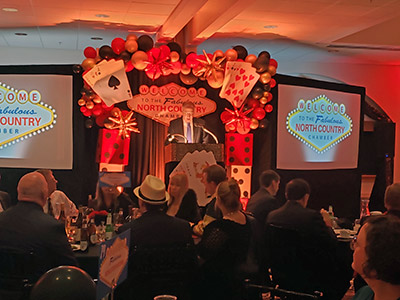 Steven Cacchio Speaking at a Podium