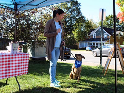 Ralitsa Looking at her Dog on a Leash