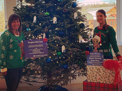 Lake Placid Employees Wearing Holiday Sweaters