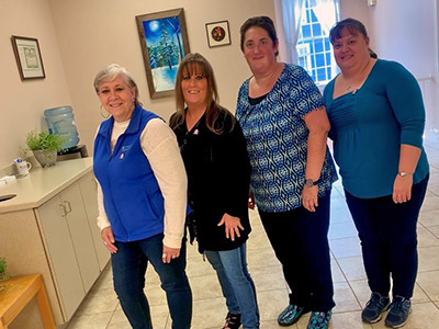 Lena, Juslyn, Courtney, and April Standing in a Line