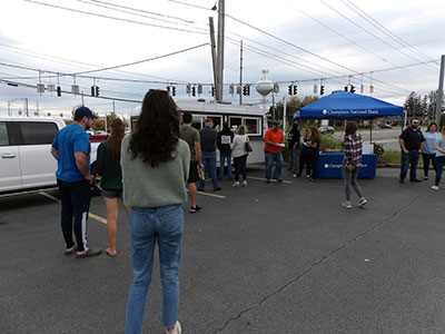 Line of people waiting to get coffee from trailer