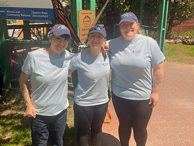 Alexandra, Emily and Gabrielle Posing Wearing Matching T-Shirts and Baseball Hats