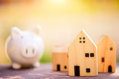 Piggy Bank and Wooden Toy Houses